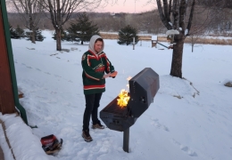 Charcoal grills at each cabin