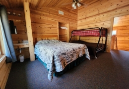 Upstairs queen bedroom with a twin over full bunk bed (sink, mirror and built-in shelving in each bedroom)