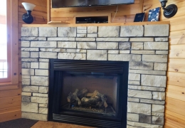 Cozy cabin gas fireplace in Big Timber