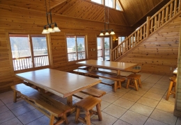 Two 8 foot log tables for large gatherings