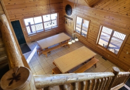 Upper level staircase over looking kitchen and gathering area