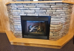 Lower level gas fireplace (1 of 2 fireplaces)