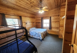 Queen bedroom with twin over full bunk (all bedrooms have a vanity sink & built-in storage area)