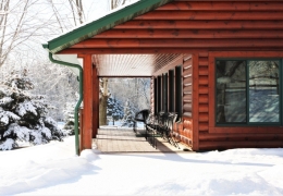 Loon's covered porch area to watch kids and young-at-heart sled down the hill