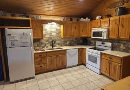 Fully stocked kitchen supplies, pots and pans