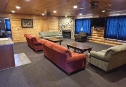 Common Room between Northwoods East and West- smart tv, 4 couches and a wet bar and beverage cooler