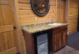 Common Room between Northwoods East and West- smart tv, 4 couches and a wet bar and beverage cooler