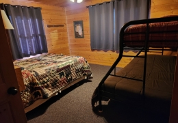 Queen bedroom with twin over full bunk