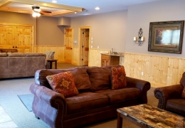 Common Room - 2 smart Tvs, 4 couches and a wet bar