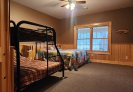 Main level queen bedroom with twin over full bunk & on suite bathroom