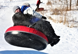 Catching some air on the tubing hill