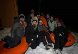 Night-time sledding and tubing on the hill