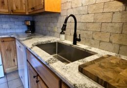 Quartz countertop and farmhouse sink