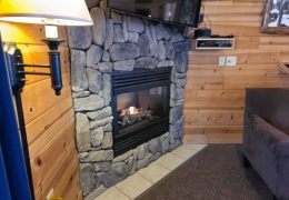 Rustic stone gas fireplace for cozy cabin getaways