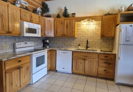 Fully stocked kitchen supplies, pots and pans